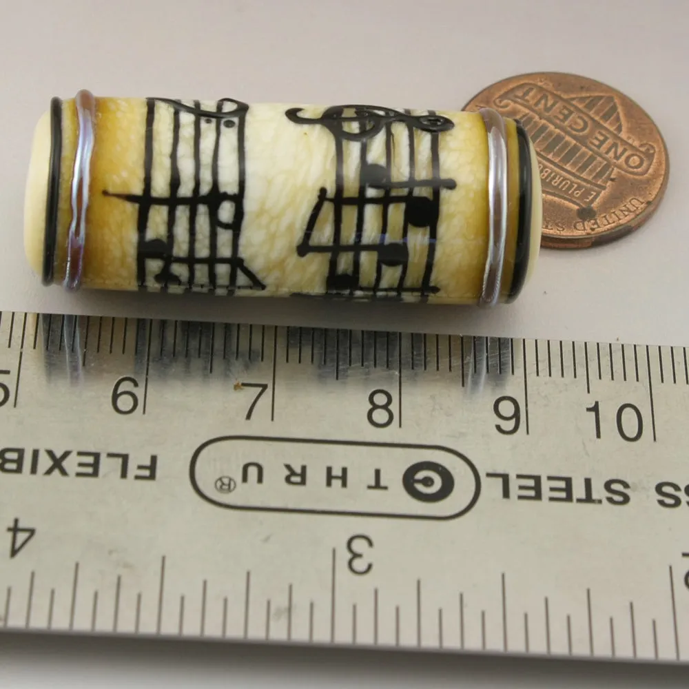 Ivory Cylinder with Black Music Notes and Metallic Trim