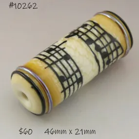 Ivory Cylinder with Black Music Notes and Metallic Trim