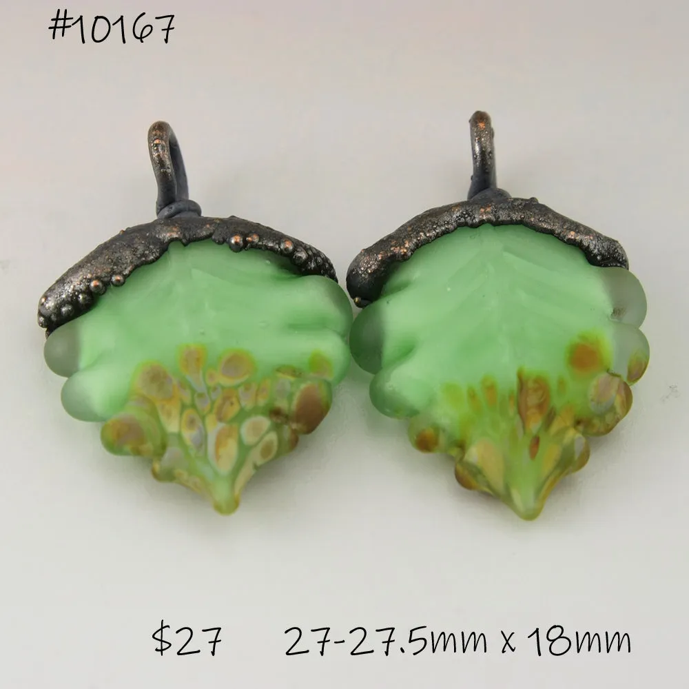 Pale Green over White Etched Raku Leaves with Copper Electroforming